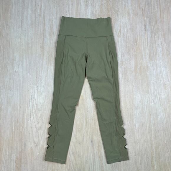 Athleta Salutation Stash Pocket II Laser Cut 7/8 Tight Olive Green Leggings XS - Picture 1 of 16